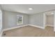 Bedroom with a neutral color scheme, fresh paint, and a large window creating a bright and inviting atmosphere at 210 Circle Dr, Smithfield, NC 27577