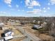 An aerial view of the neighborhood, with blue skies in the background at 231 Patterson Dr, Roxboro, NC 27573