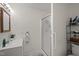 This bathroom features a shower with glass door, vanity with sink, and toilet at 231 Patterson Dr, Roxboro, NC 27573