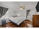 Bedroom with hardwood floors, natural light, and a nice closet at 231 Patterson Dr, Roxboro, NC 27573