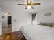 The bedroom boasts hardwood floors and a ceiling fan at 231 Patterson Dr, Roxboro, NC 27573