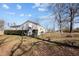 Charming home exterior featuring neat landscaping and a well-maintained lawn at 231 Patterson Dr, Roxboro, NC 27573