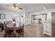 Bright and airy kitchen and dining room with natural light, lots of cabinetry, and stainless appliances at 231 Patterson Dr, Roxboro, NC 27573