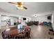 Spacious living room featuring an open floor plan, updated flooring, and lots of natural light at 231 Patterson Dr, Roxboro, NC 27573