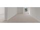 Bright bedroom with a window offering natural light, featuring neutral carpeting at 2561 Summersby Dr, Mebane, NC 27302