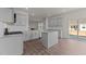 The kitchen boasts granite countertops, a center island, and stainless steel appliances at 2561 Summersby Dr, Mebane, NC 27302