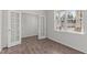 Home office/study with hard wood floors, double doors, a large window, and freshly painted walls at 2561 Summersby Dr, Mebane, NC 27302