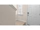 Bright entryway with a front door, carpet on the stairs and natural light at 262 Palm Dr, Sanford, NC 27332