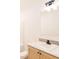 Bright bathroom with a sleek vanity, framed mirror, and modern lighting at 29 Hinshaw Shop Rd, Liberty, NC 27298