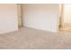 Comfortable bedroom features a large open space, neutral wall colors, and plush carpet at 29 Hinshaw Shop Rd, Liberty, NC 27298