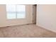 Cozy bedroom with plush carpet and neutral wall colors at 29 Hinshaw Shop Rd, Liberty, NC 27298