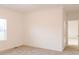 Well-lit bedroom with plush carpet and neutral wall colors and a large window at 29 Hinshaw Shop Rd, Liberty, NC 27298