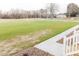 Expansive green lawn stretching from the front porch to a view of neighboring homes at 29 Hinshaw Shop Rd, Liberty, NC 27298