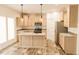Well-equipped kitchen features stainless steel appliances, custom cabinets, and a center island at 29 Hinshaw Shop Rd, Liberty, NC 27298