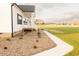 Well landscaped home featuring a beautiful sidewalk and manicured shrubbery at 29 Hinshaw Shop Rd, Liberty, NC 27298