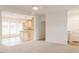 Spacious living room flows into the kitchen with ample natural light and modern finishes at 29 Hinshaw Shop Rd, Liberty, NC 27298