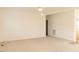 Large living room with neutral carpet and ceiling fan provides a comfortable living space at 29 Hinshaw Shop Rd, Liberty, NC 27298