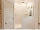 Modern bathroom features an open shower with rain shower head and decorative tile at 29 Hinshaw Shop Rd, Liberty, NC 27298