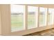 Large windows let in ample natural light and provide scenic views of the outside at 29 Hinshaw Shop Rd, Liberty, NC 27298
