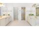 Spacious bathroom with dual sink vanity, tiled shower, and separate toilet room at 2909 Hawtree Dr, Raleigh, NC 27613