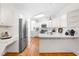 Spacious kitchen offering sleek, stainless steel appliances and abundant natural light at 2909 Hawtree Dr, Raleigh, NC 27613