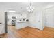 Kitchen and dining area boasting ample space and modern lighting at 2909 Hawtree Dr, Raleigh, NC 27613