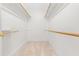 Walk-in closet with neutral carpet and multiple shelves at 2909 Hawtree Dr, Raleigh, NC 27613