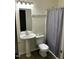 Bathroom featuring vanity sink, toilet, and shower at 309 Gladstone Dr, Durham, NC 27703