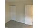 Bedroom with storage closet and neutral carpet at 309 Gladstone Dr, Durham, NC 27703