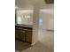 Efficient kitchen space with stainless steel appliances and wood cabinets, open to the living area for easy entertaining at 309 Gladstone Dr, Durham, NC 27703