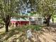 Backyard view of the house, showcasing the deck and exterior at 328 Cone Dr, Henderson, NC 27537