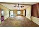 Spacious living room with multiple ceiling fans at 328 Cone Dr, Henderson, NC 27537