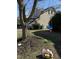 Backyard with swing on tree, some yard toys, and house in background at 3742 Marshlane Way, Raleigh, NC 27610