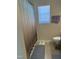 Neutral bathroom with a decorative shower curtain, a window with blinds, and a towel rack at 3742 Marshlane Way, Raleigh, NC 27610