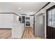 Modern kitchen featuring white cabinets, stainless steel appliances, and a functional island at 409 S 13Th St, Lillington, NC 27546