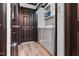 Functional laundry room with washer, dryer, and storage shelves offering convenience and organization at 409 S 13Th St, Lillington, NC 27546