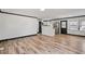 Bright and airy living room featuring hardwood floors and an open layout to the updated kitchen at 409 S 13Th St, Lillington, NC 27546
