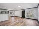 Inviting living room featuring hardwood floors and an open layout, with backyard views at 409 S 13Th St, Lillington, NC 27546