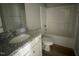 Bathroom featuring a single vanity and a shower-tub combo at 42 Heatherglenn Cir, Princeton, NC 27569