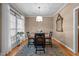 Inviting dining room with natural light, elegant chandelier, and stylish decor at 4278 Aviemore, Burlington, NC 27215