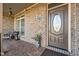 Cozy front porch showcasing decorative accents, elegant door, and welcoming ambiance at 4278 Aviemore, Burlington, NC 27215