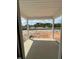 Covered patio area offering a view of the spacious backyard, perfect for outdoor entertaining at 432 E Clydes Point Way, Wendell, NC 27591