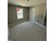 Bedroom with window and closet ready for customization and comfort at 432 E Clydes Point Way, Wendell, NC 27591