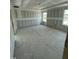 Unfinished bedroom features two windows with natural light and doorway at 432 E Clydes Point Way, Wendell, NC 27591