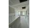 Hallway of unfinished home showing two large windows and a view to another room at 432 E Clydes Point Way, Wendell, NC 27591