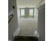 Upstairs landing area with natural light from two windows ready for personalization at 432 E Clydes Point Way, Wendell, NC 27591