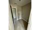 Neutral laundry room featuring baseboards, fresh paint, and new construction; ready for appliances and functionality at 432 E Clydes Point Way, Wendell, NC 27591