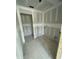 Unfinished laundry room with rough in for appliances and large entry way at 432 E Clydes Point Way, Wendell, NC 27591