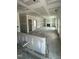 Expansive unfinished living room featuring drywall, fireplace, and abundant natural light from surrounding windows at 432 E Clydes Point Way, Wendell, NC 27591