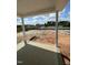 Back patio showing beautiful backyard view perfect for outdoor living at 432 E Clydes Point Way, Wendell, NC 27591